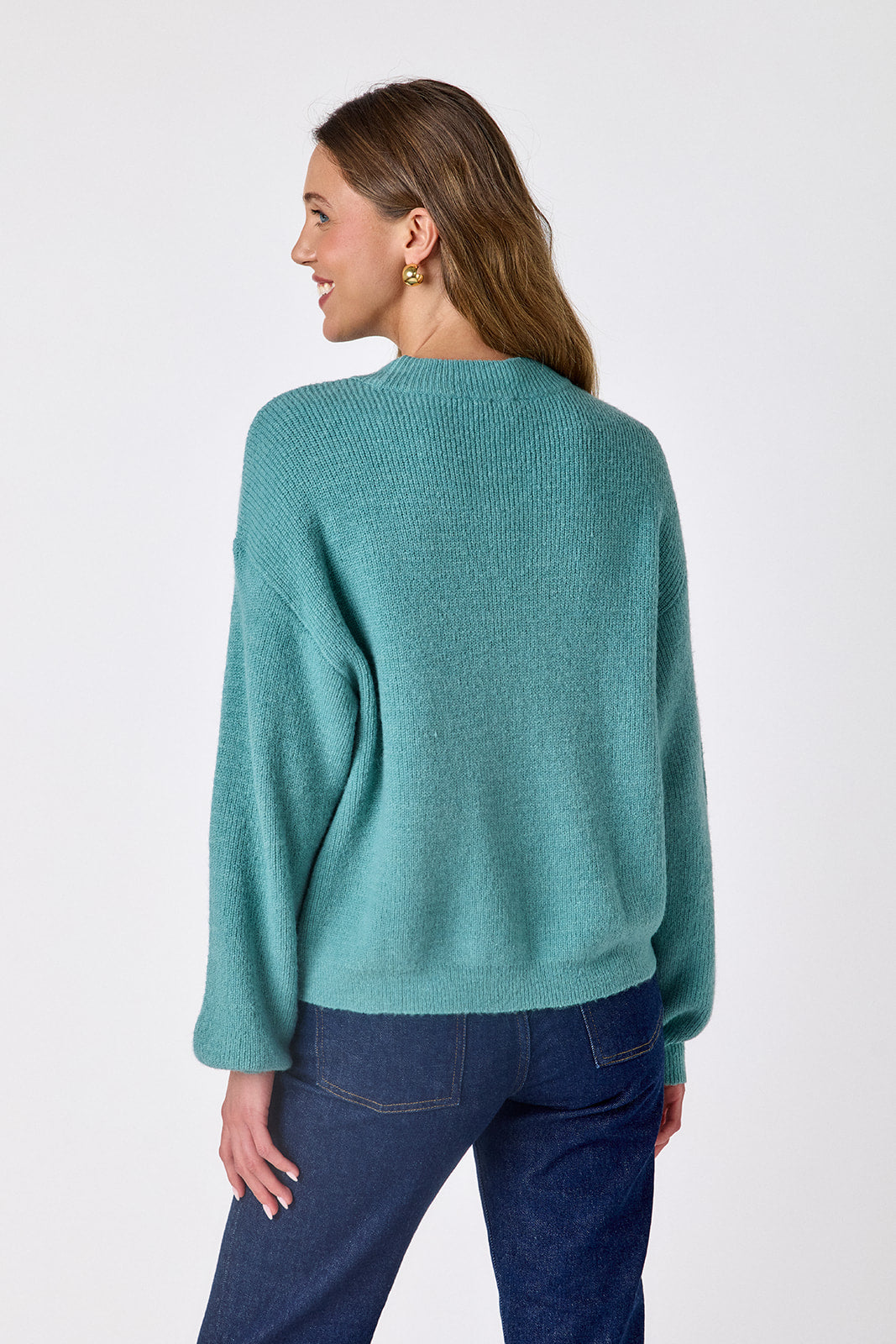 Amazonite drop shoulder sweater with floral detailing on model – CROSBY by Mollie Burch