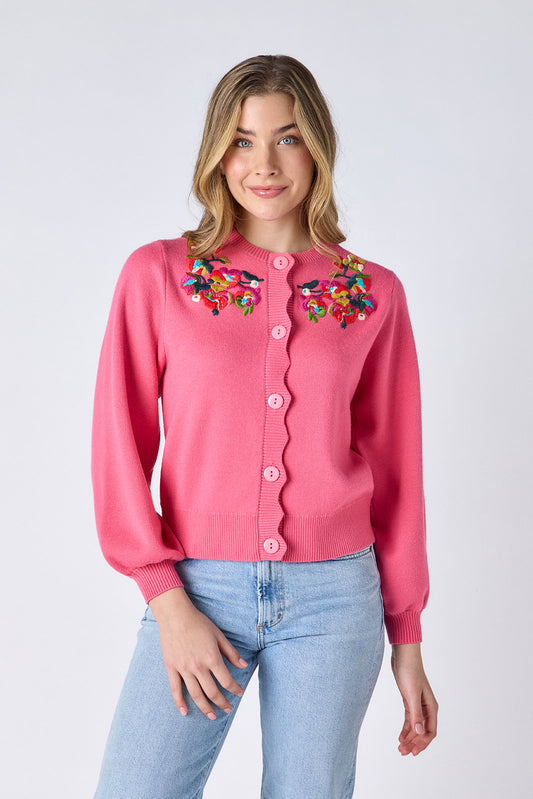 Cherry Blossom sweater with embroidered floral detail and scalloped placket on model — CROSBY by Mollie Burch