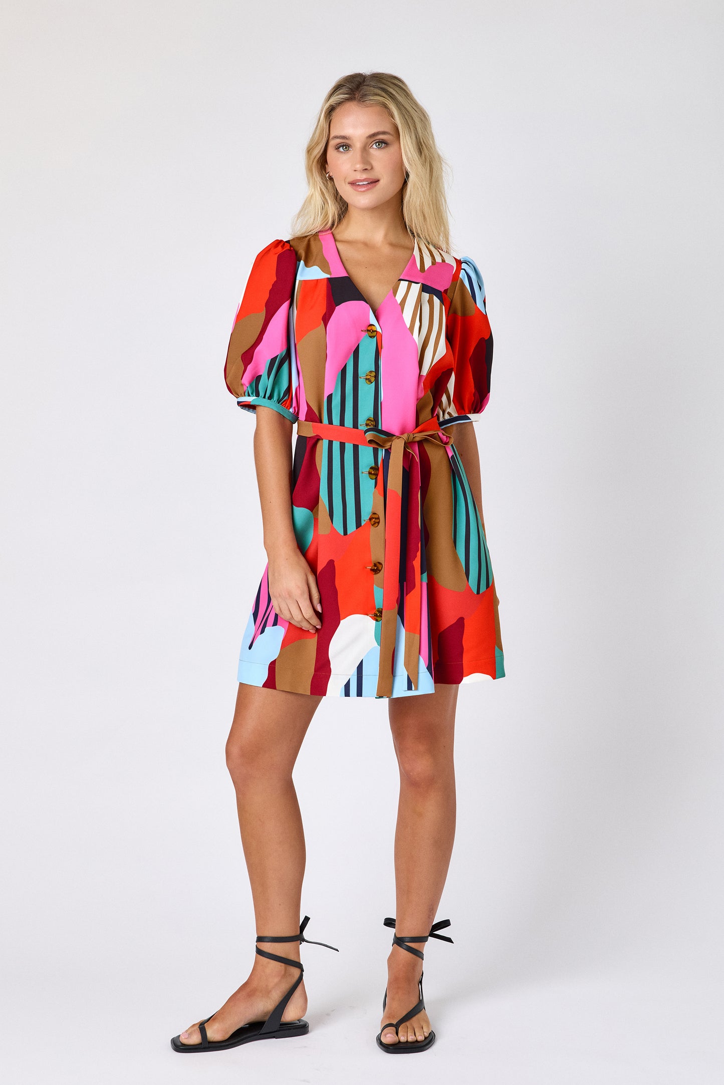 Field Study v-neck dress with puff sleeves and a swingy silhouette on model — CROSBY by Mollie Burch