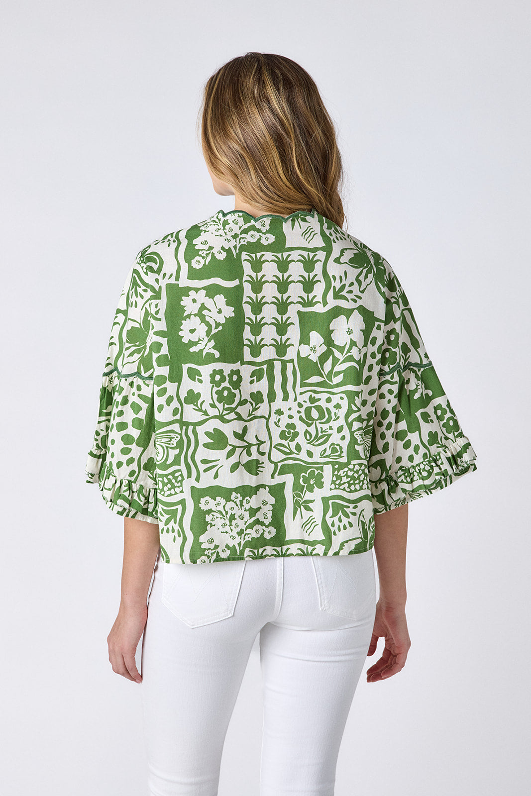Gardener cotton top with scallop neckline and button-down front on model — CROSBY by Mollie Burch