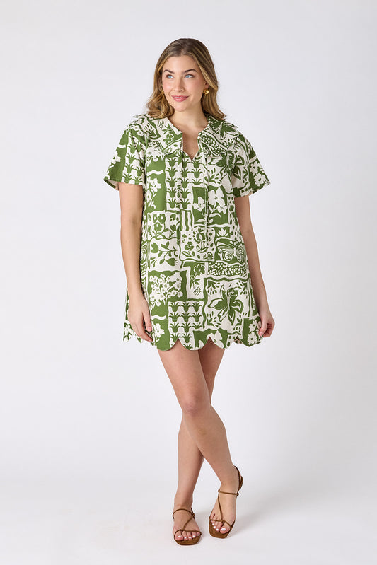Gardener mini dress with scalloped collar and hem on model — CROSBY by Mollie Burch