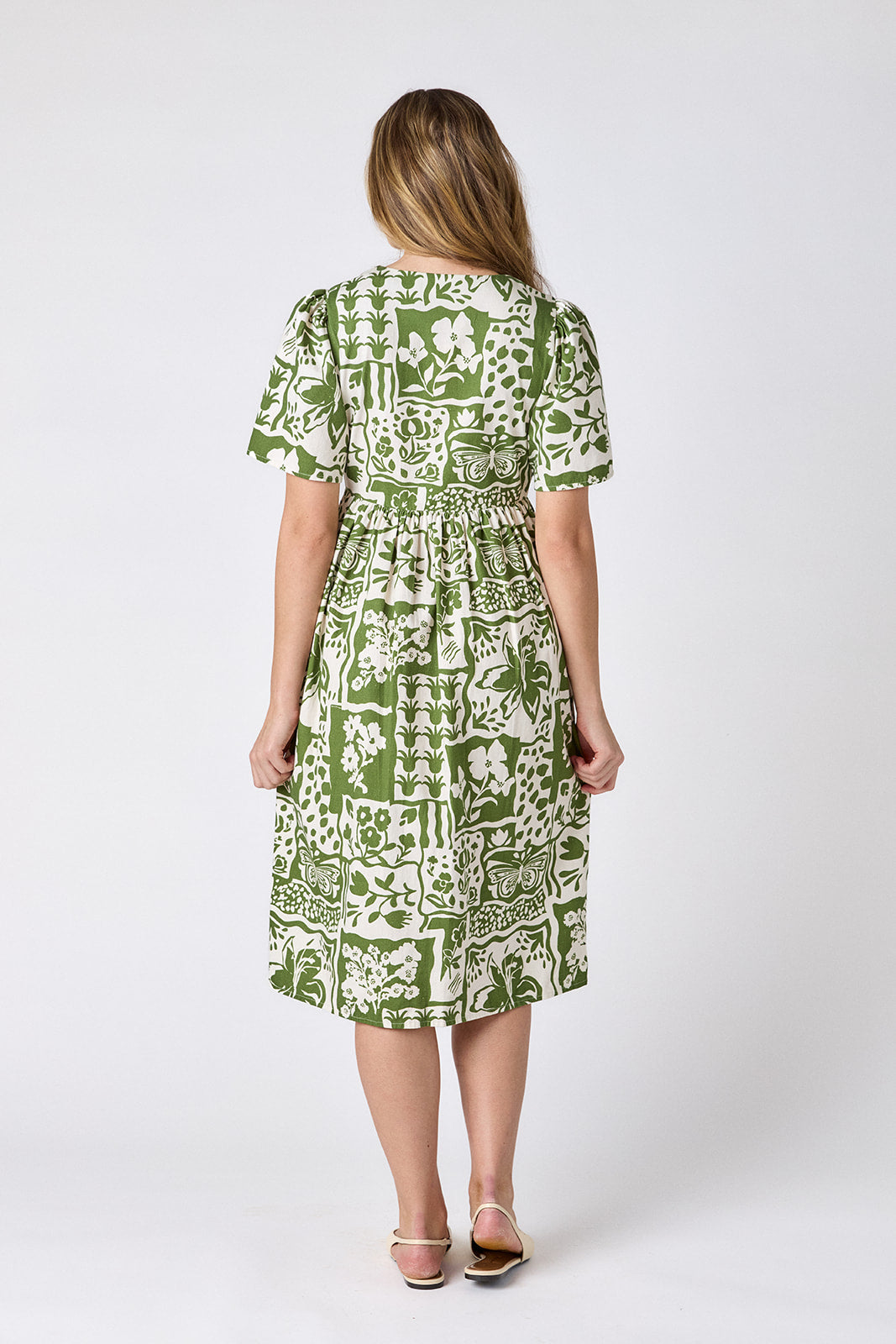Gardener button-down midi dress with V-neck and short sleeves on model — CROSBY by Mollie Burch