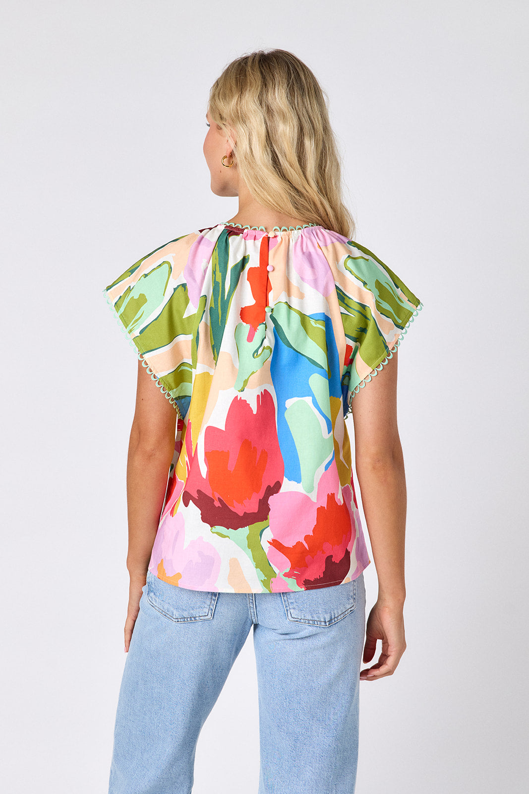Painted Petals raglan style short sleeve top on model — CROSBY by Mollie Burch