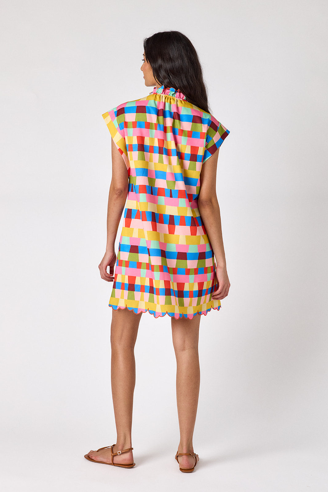 Prism button-front mini dress with scallop hem on model — CROSBY by Mollie Burch