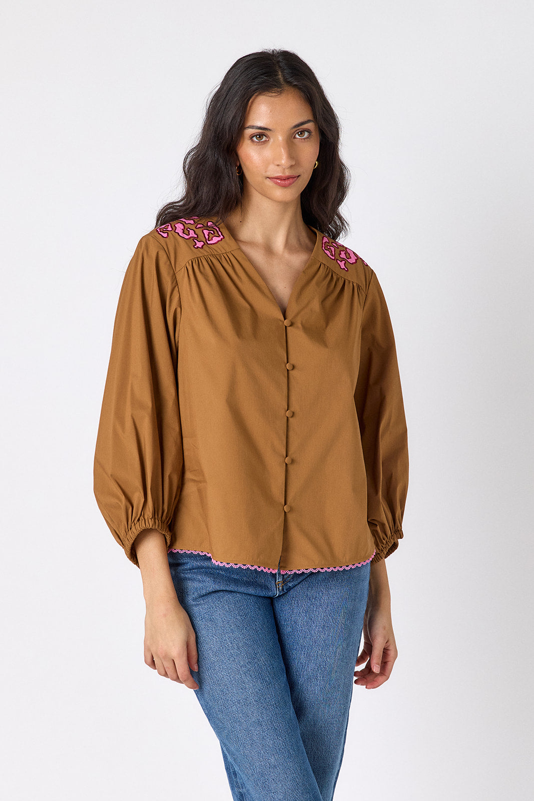 Teak button-front v-neck blouse with voluminous sleeve on model – CROSBY by Mollie Burch