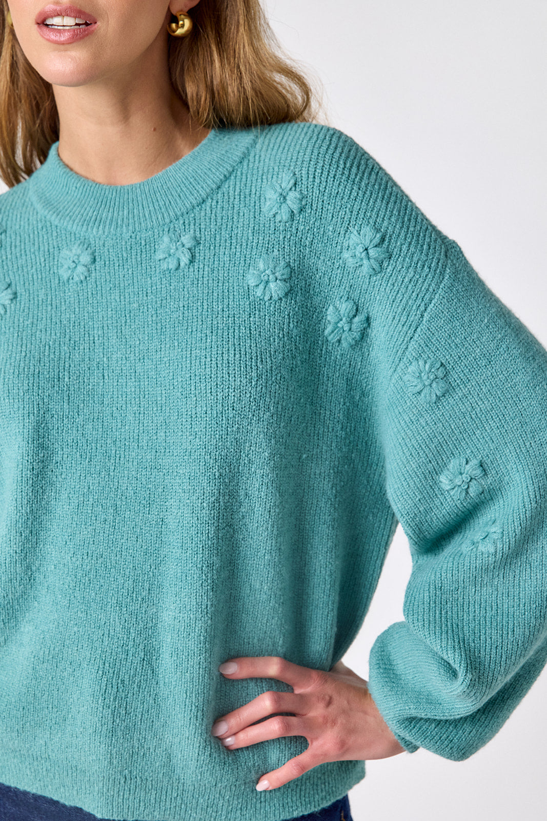 Amazonite drop shoulder sweater with floral detailing on model – CROSBY by Mollie Burch