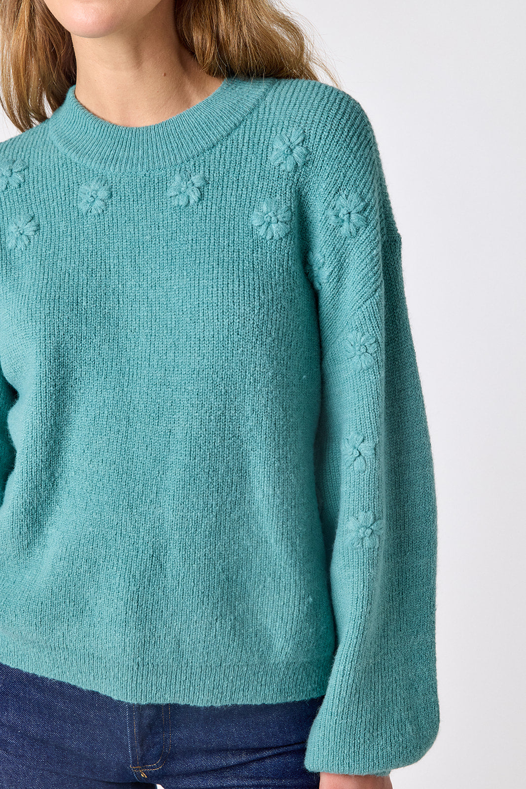 Amazonite drop shoulder sweater with floral detailing on model – CROSBY by Mollie Burch