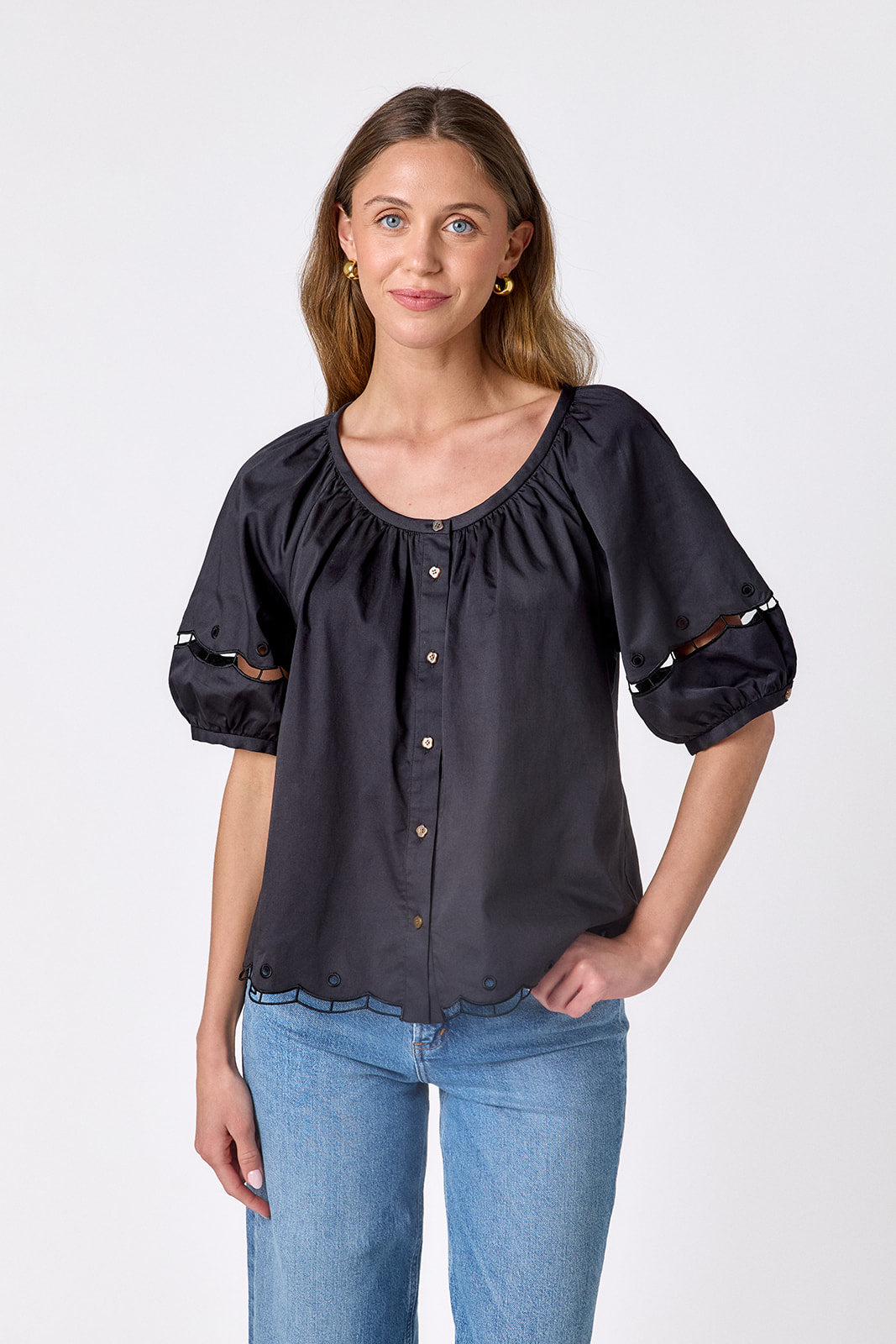 Black button front top with balloon sleeves and fagoting detail on model — CROSBY by Mollie Burch