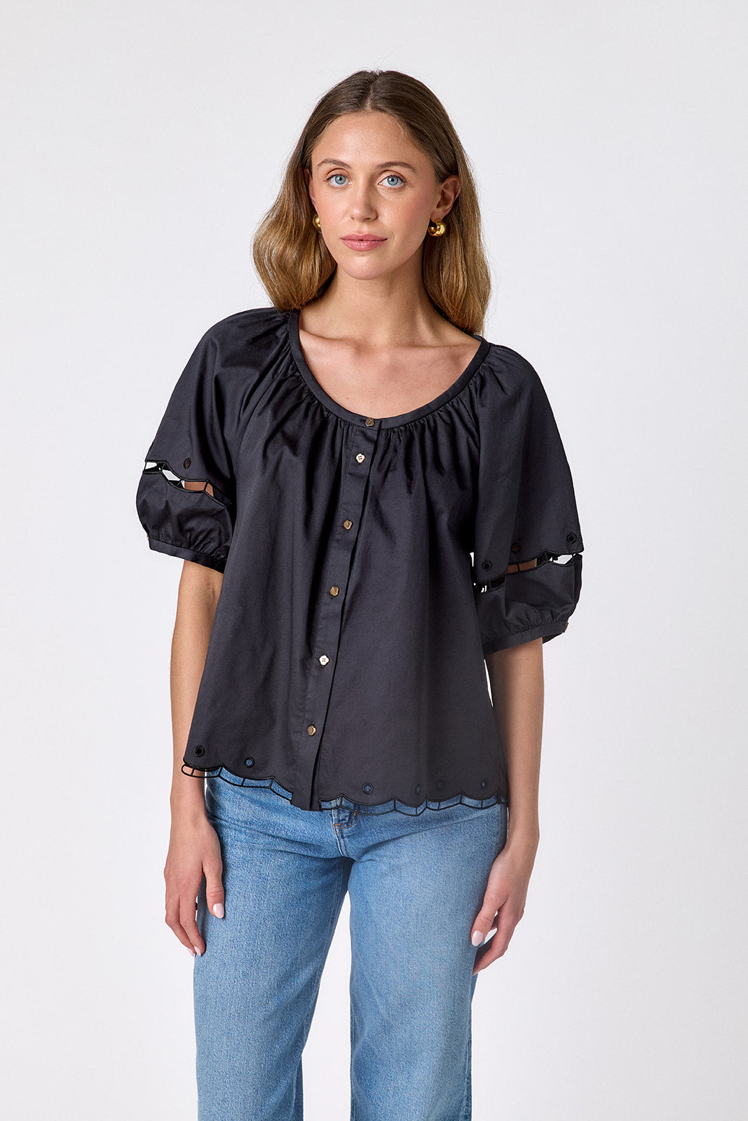 Black button front top with balloon sleeves and fagoting detail on model — CROSBY by Mollie Burch