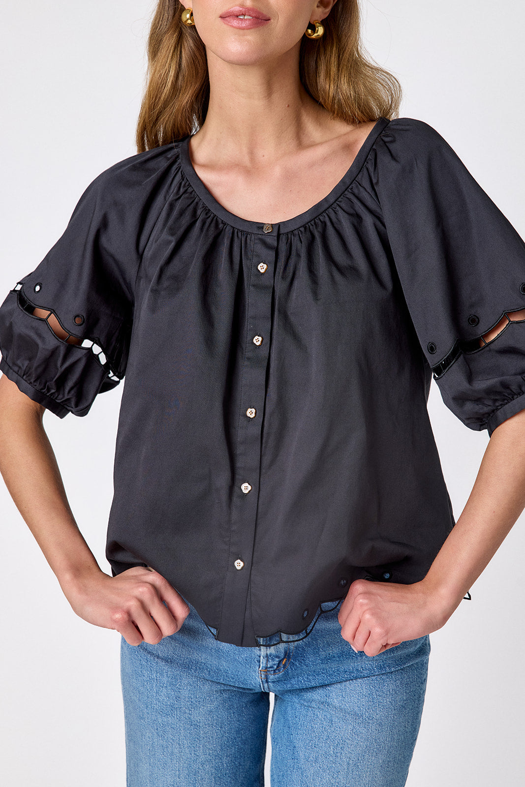 Black button front top with balloon sleeves and fagoting detail on model — CROSBY by Mollie Burch