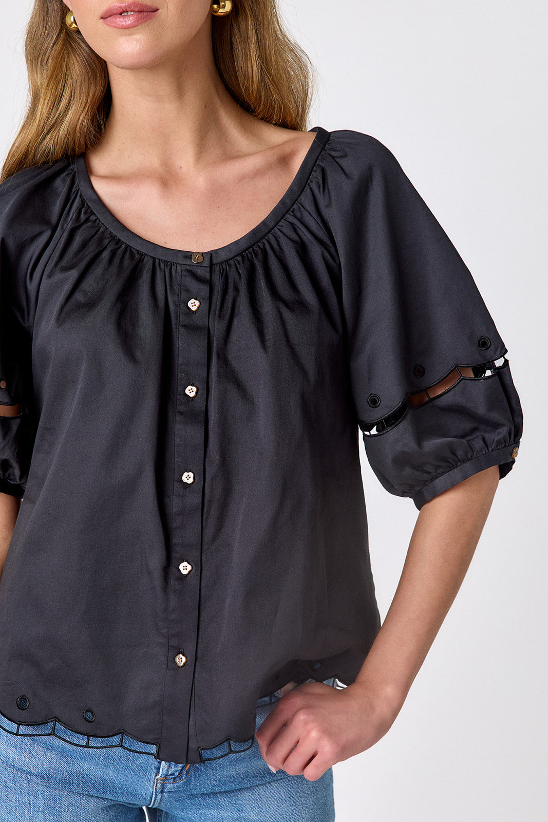 Black button front top with balloon sleeves and fagoting detail on model — CROSBY by Mollie Burch
