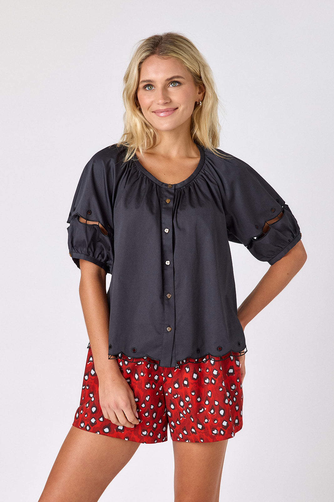 Black button front top with balloon sleeves and fagoting detail with Pheasant short on model — CROSBY by Mollie Burch