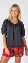 Black button front top with balloon sleeves and fagoting detail with Pheasant short on model — CROSBY by Mollie Burch