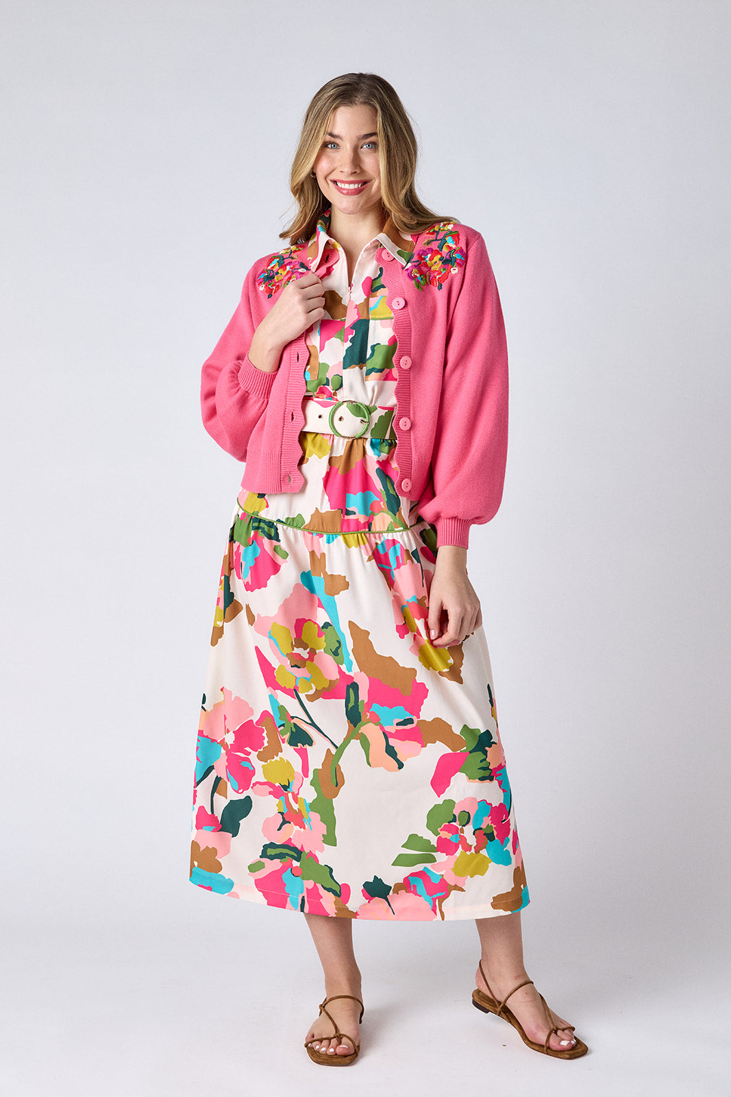 Cherry Blossom sweater with embroidered floral detail and scalloped placket on model — CROSBY by Mollie Burch