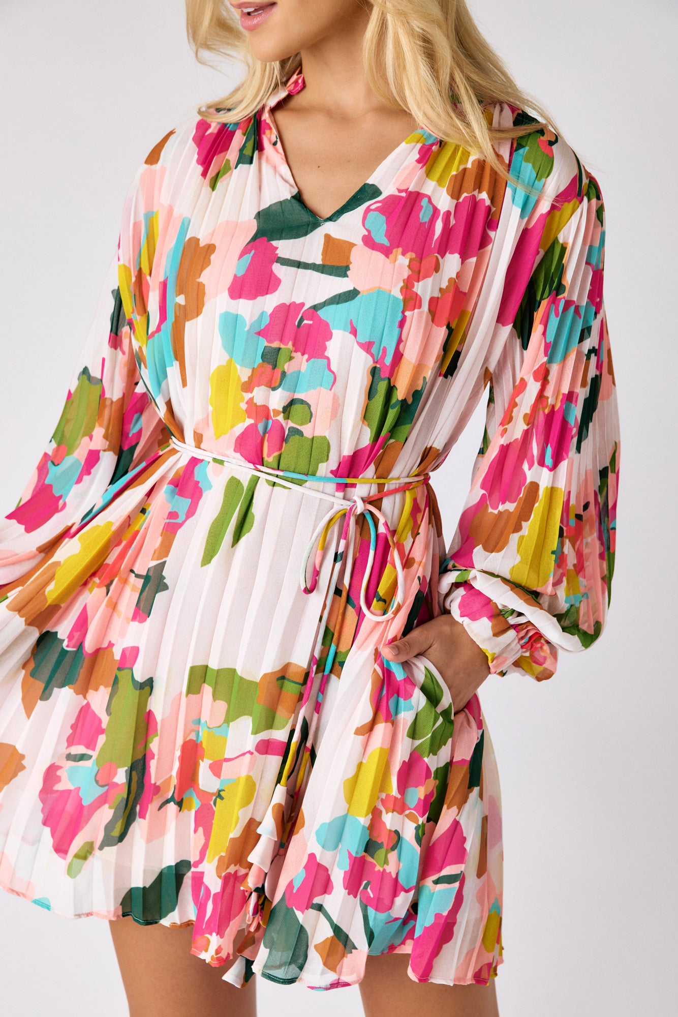 Botanic Blush pleated tent dress on model — CROSBY by Mollie Burch