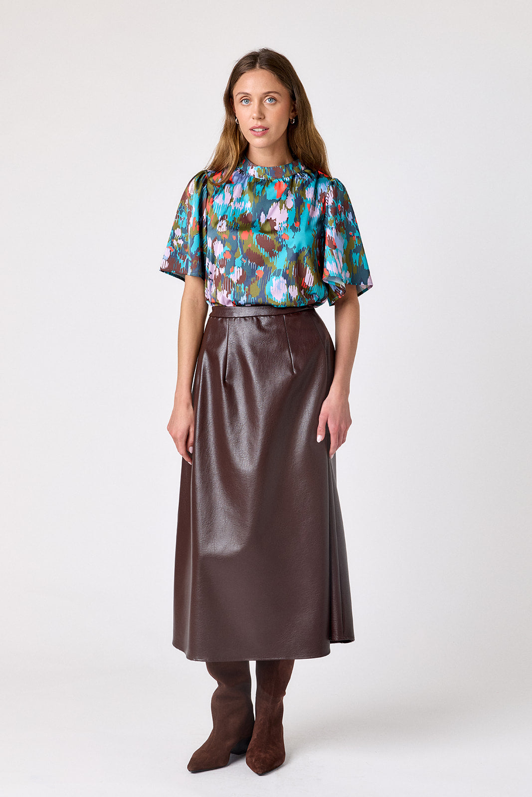 Brownie voluminous faux leather A-line skirt on model – CROSBY by Mollie Burch