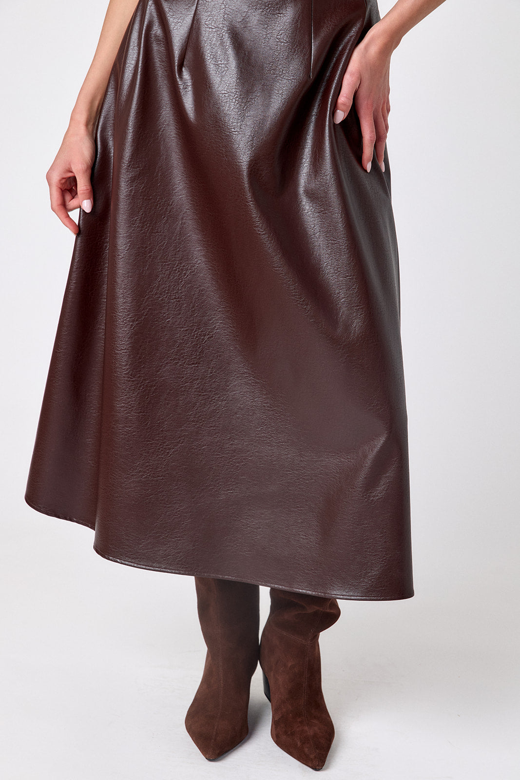 Brownie voluminous faux leather A-line skirt on model – CROSBY by Mollie Burch