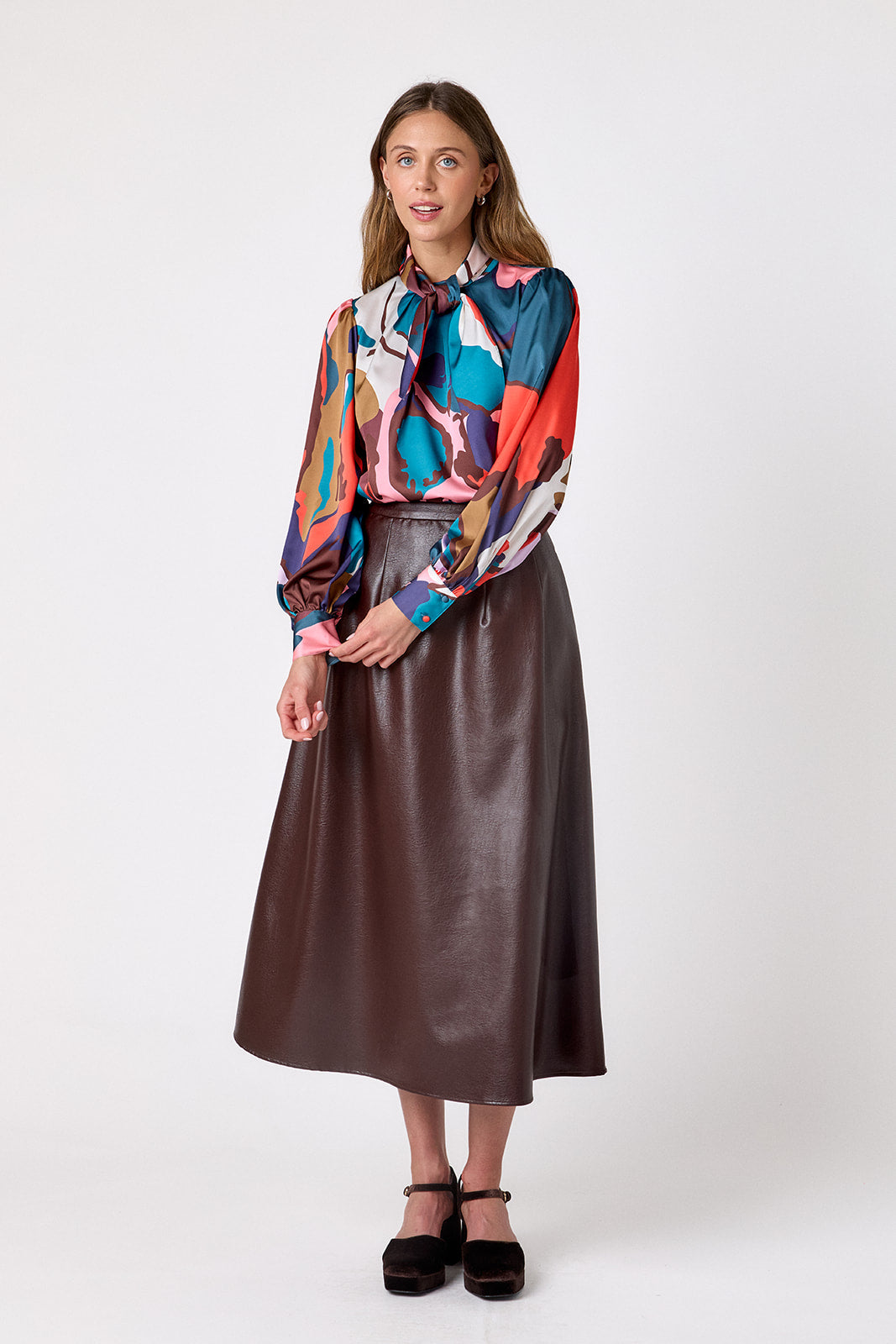 Brownie voluminous faux leather A-line skirt on model – CROSBY by Mollie Burch
