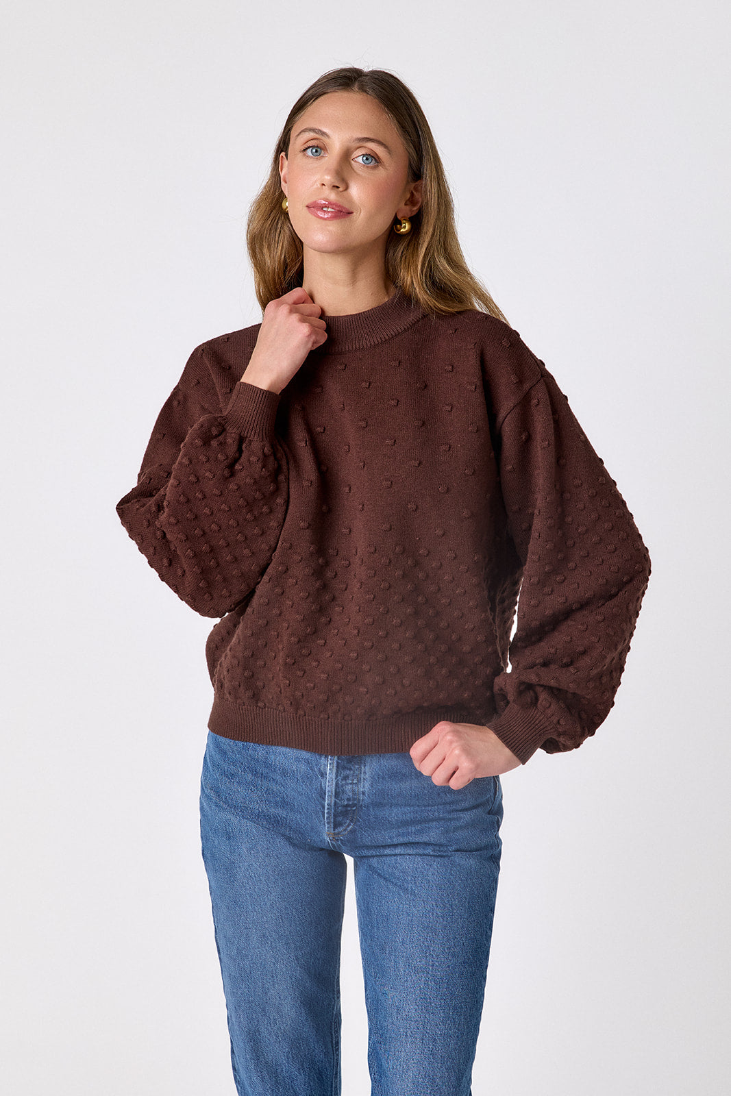 Brownie drop shoulder sweater with dotwork detailing on model – CROSBY by Mollie Burch