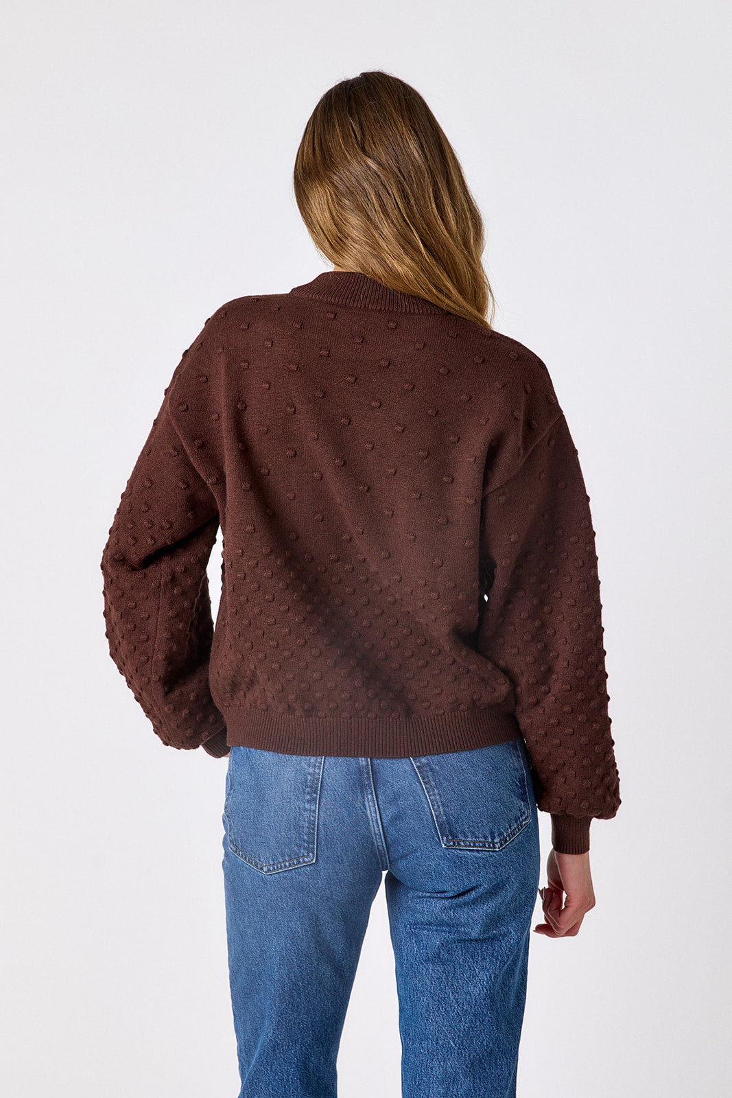 Brownie drop shoulder sweater with dotwork detailing on model – CROSBY by Mollie Burch