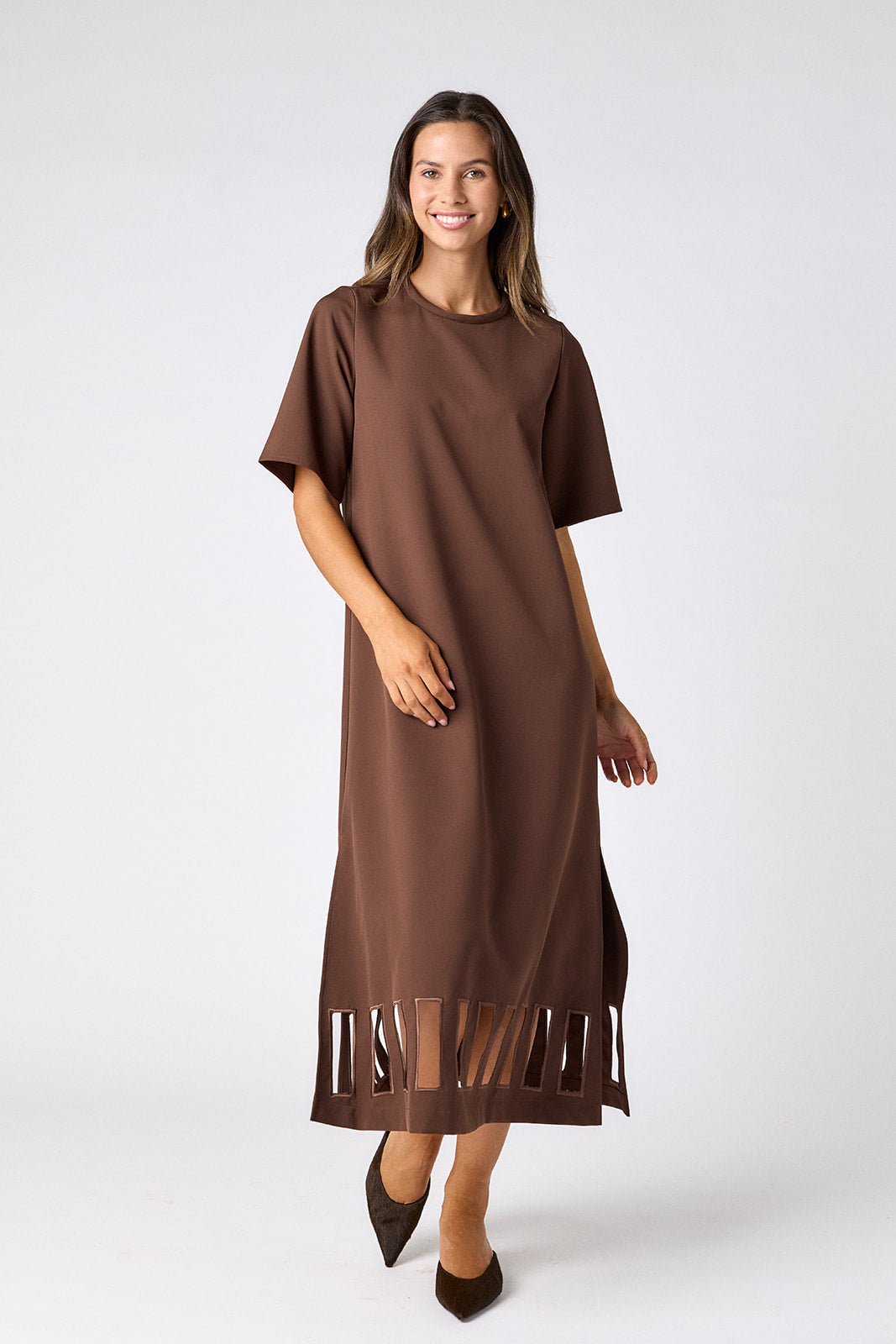 Brownie short sleeve ankle-length dress with a straight fit on model – CROSBY by Mollie Burch