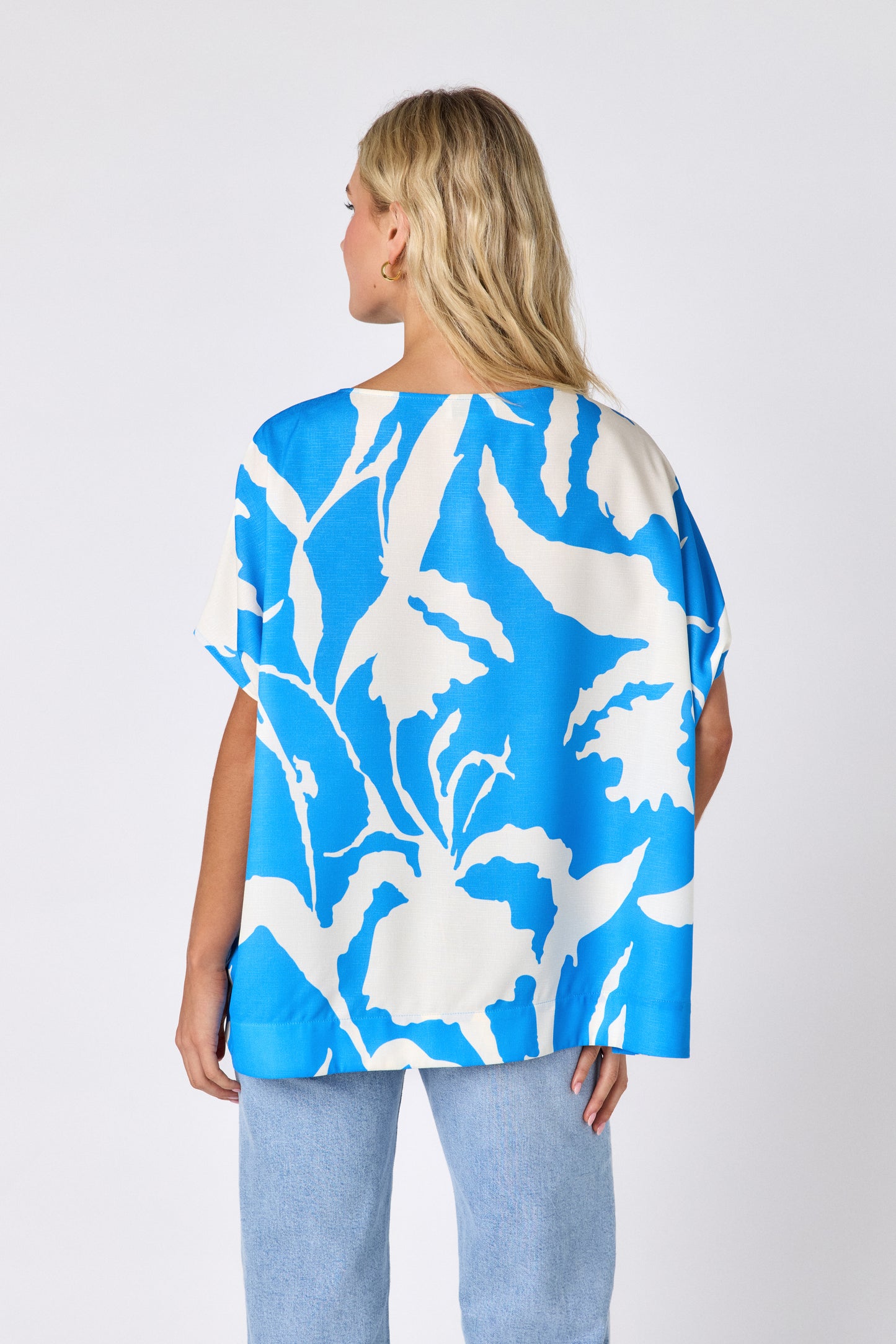 Blue Fern oversized short sleeve tunic on model — CROSBY by Mollie Burch