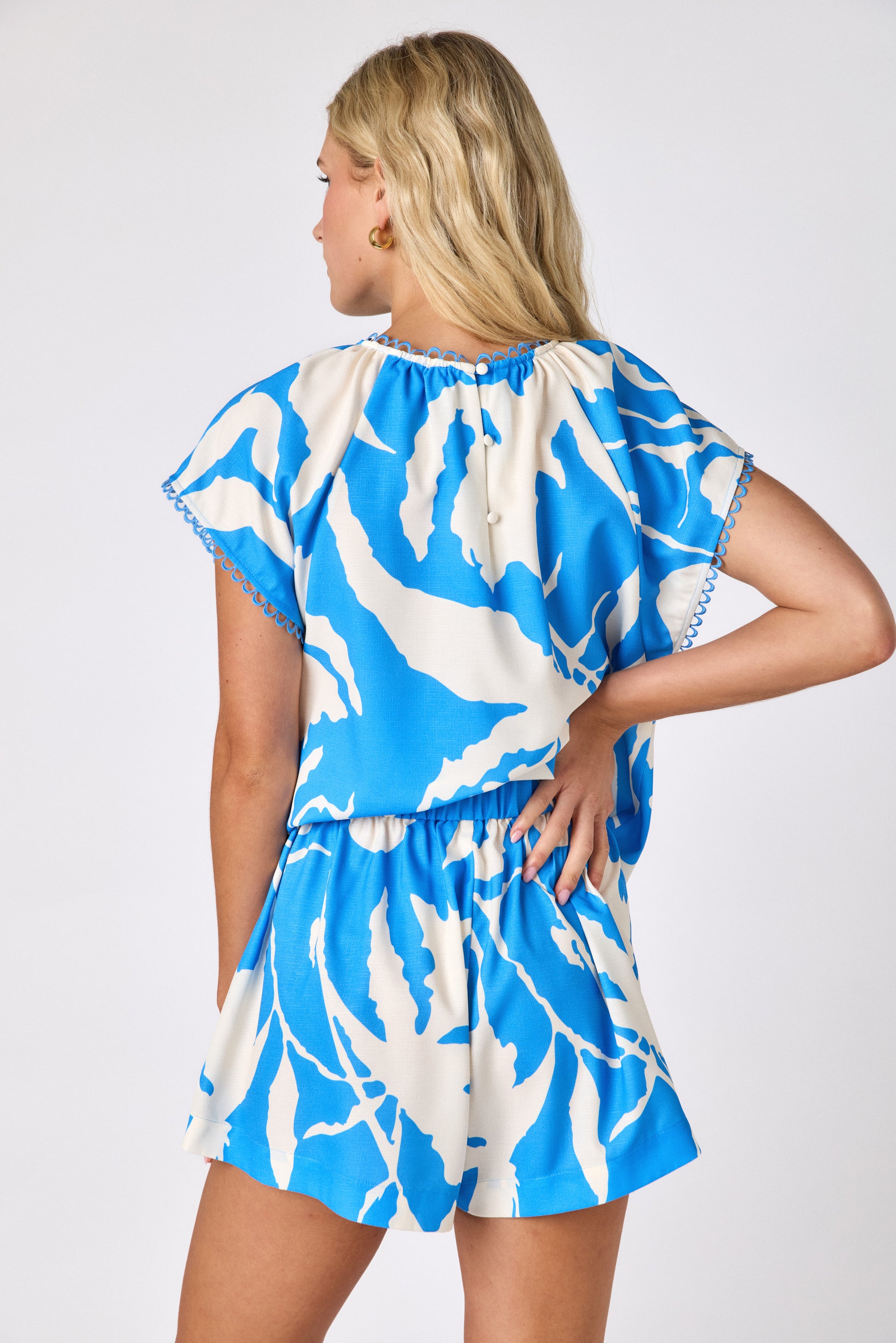 Blue Fern relaxed mid-thigh short on model — CROSBY by Mollie Burch