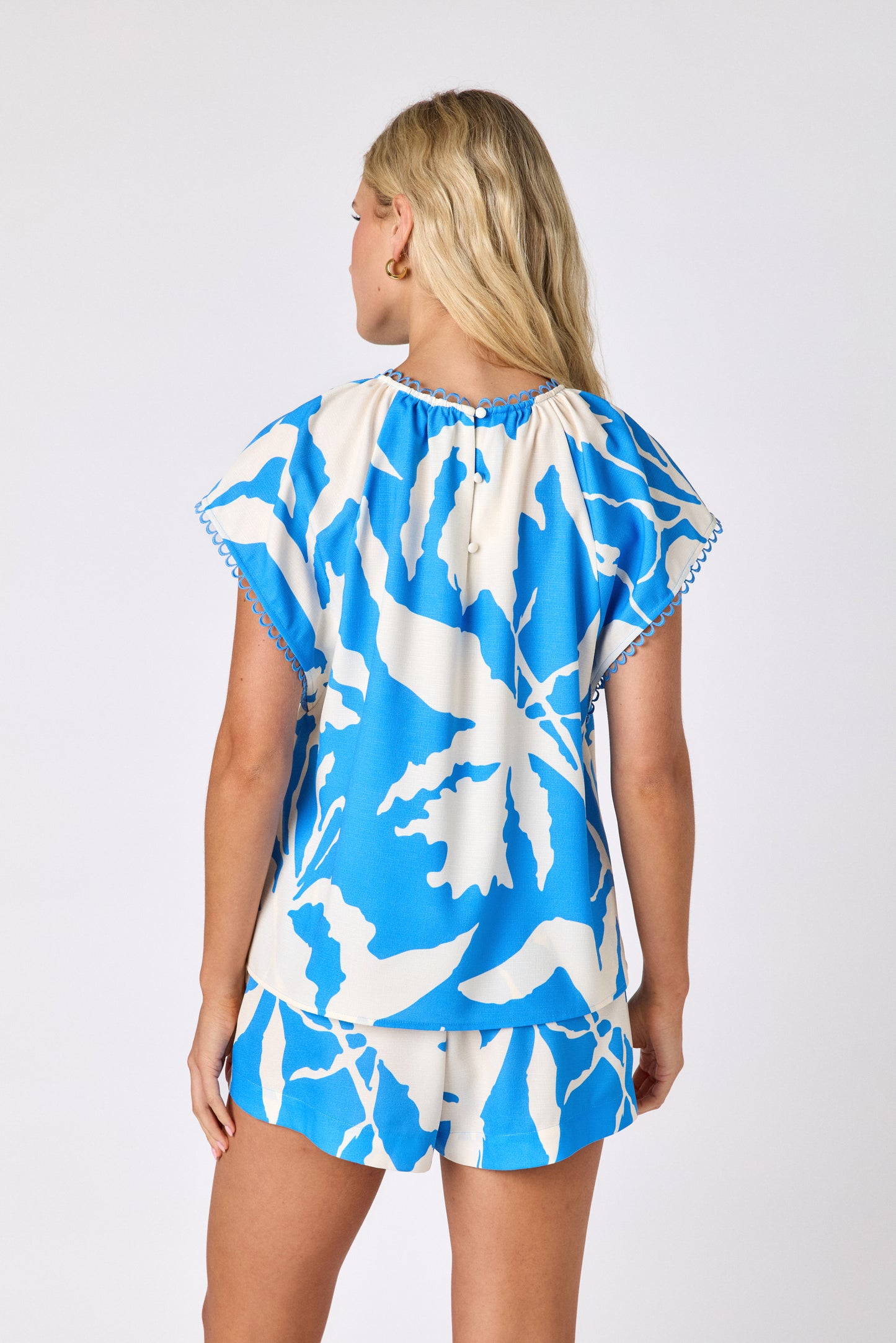 Blue Fern relaxed mid-thigh short on model — CROSBY by Mollie Burch