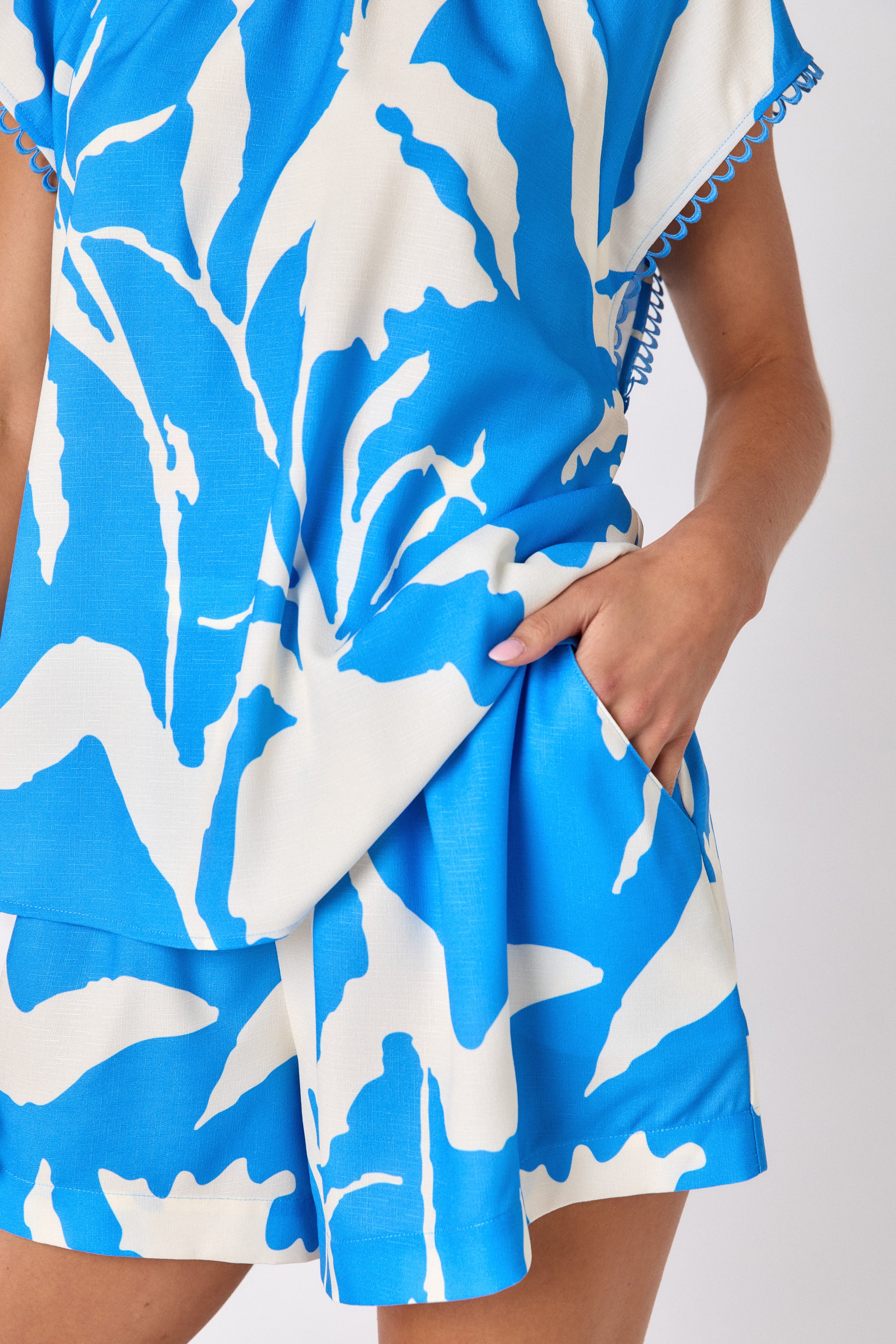 Blue Fern relaxed mid-thigh short on model — CROSBY by Mollie Burch