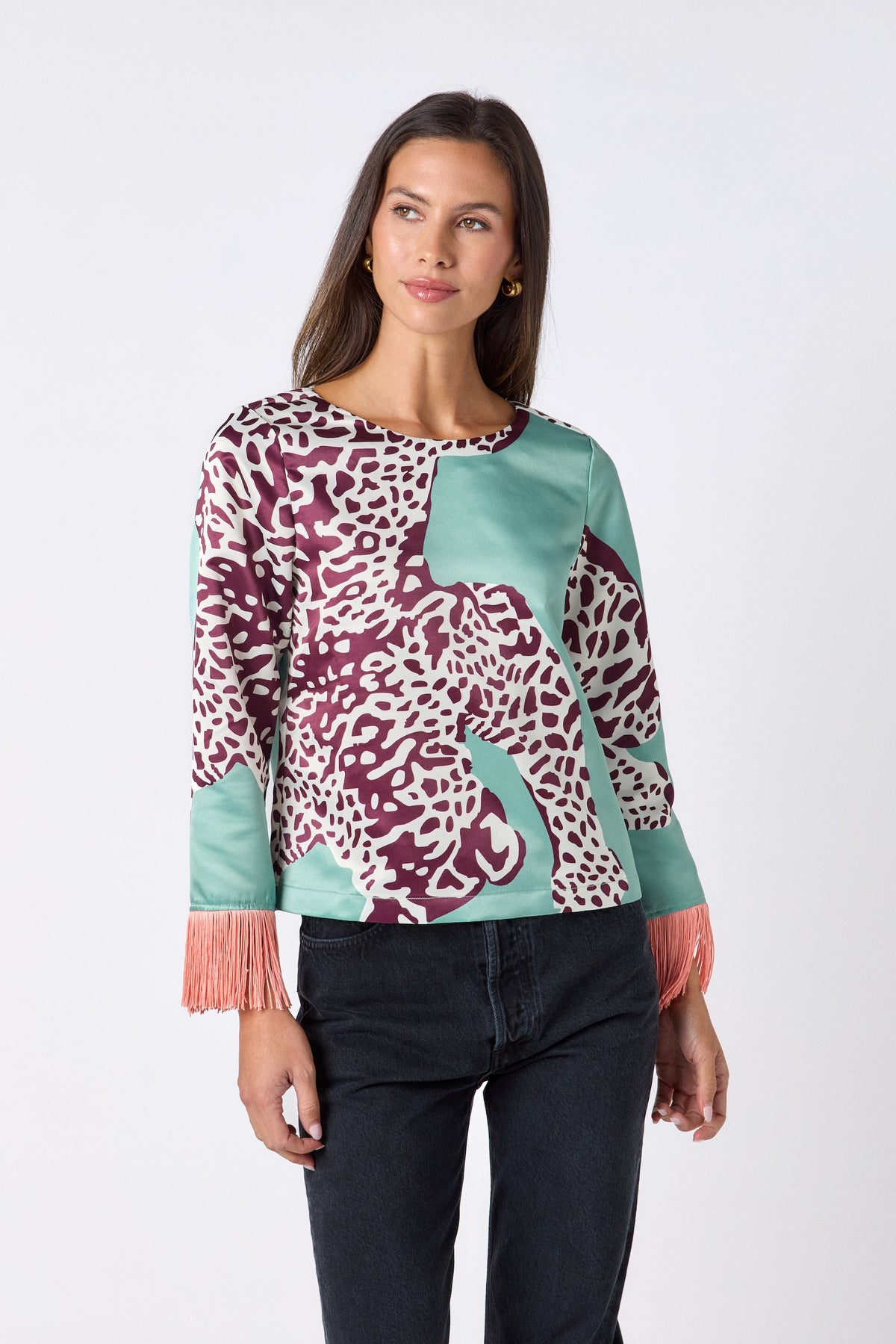 Maya Top in Mint Catwalk featuring contrast fringe sleeve cuffs and back neck tie detailing on model – CROSBY by Mollie Burch