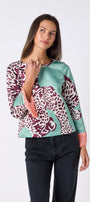 Maya Top in Mint Catwalk featuring contrast fringe sleeve cuffs and back neck tie detailing on model – CROSBY by Mollie Burch