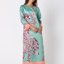 Drewry Dress in Mint Catwalk featuring contrast fringe trim on model – CROSBY by Mollie Burch