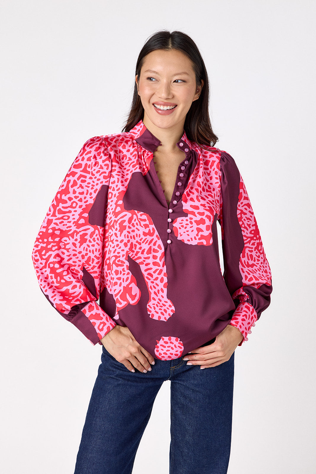 Leland Blouse in Pink Catwalk featuring puff sleeves and gold-rimmed buttons on model – CROSBY by Mollie Burch