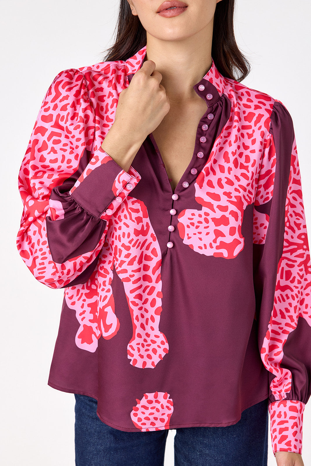 Leland Blouse in Pink Catwalk featuring puff sleeves and gold-rimmed buttons on model – CROSBY by Mollie Burch