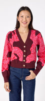 Catwalk Pink v-neck cardigan with scallop detail on model – CROSBY by Mollie Burch