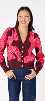 Catwalk Pink v-neck cardigan with scallop detail on model – CROSBY by Mollie Burch