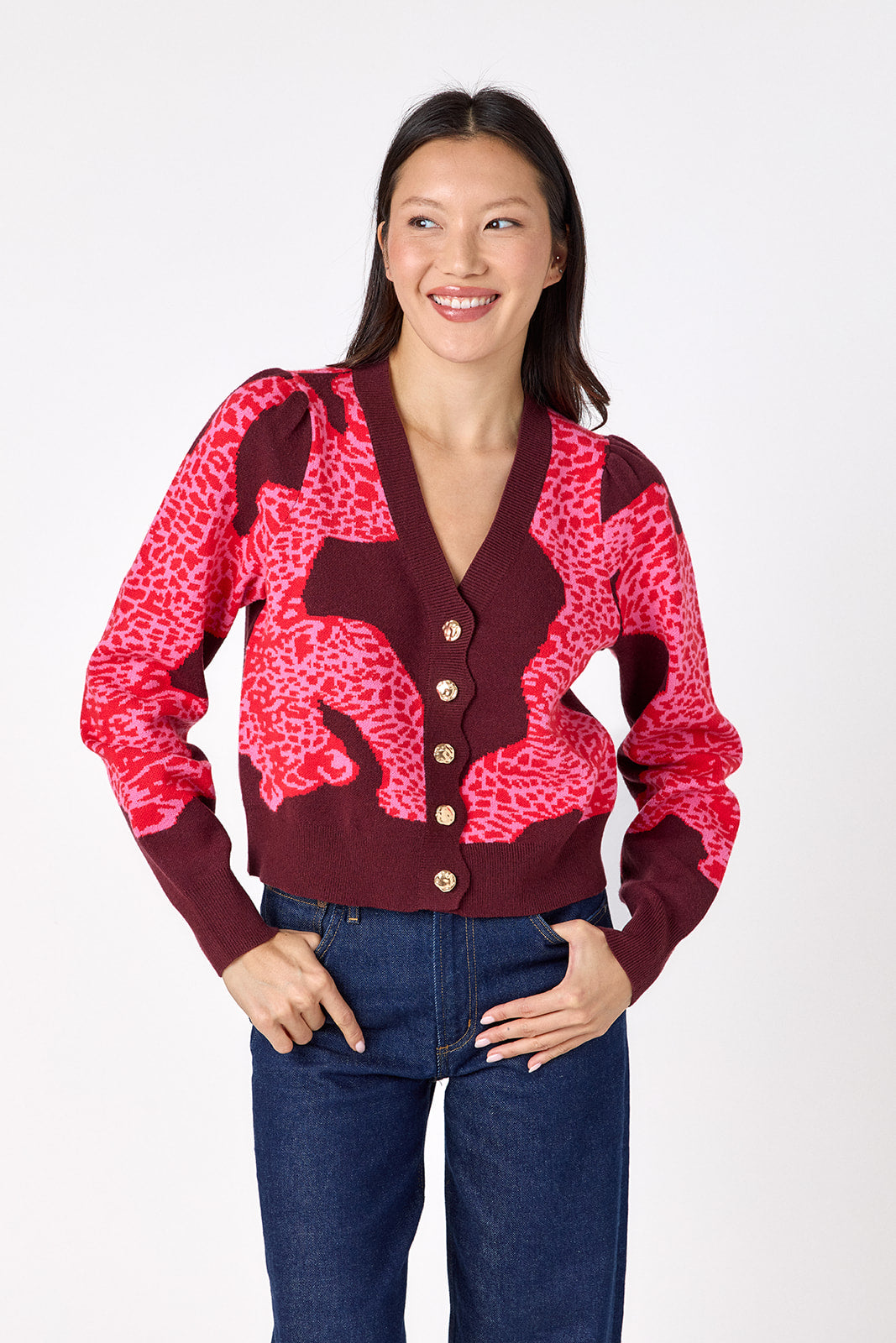 Catwalk Pink v-neck cardigan with scallop detail on model – CROSBY by Mollie Burch