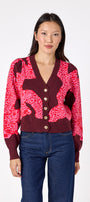 Catwalk Pink v-neck cardigan with scallop detail on model – CROSBY by Mollie Burch