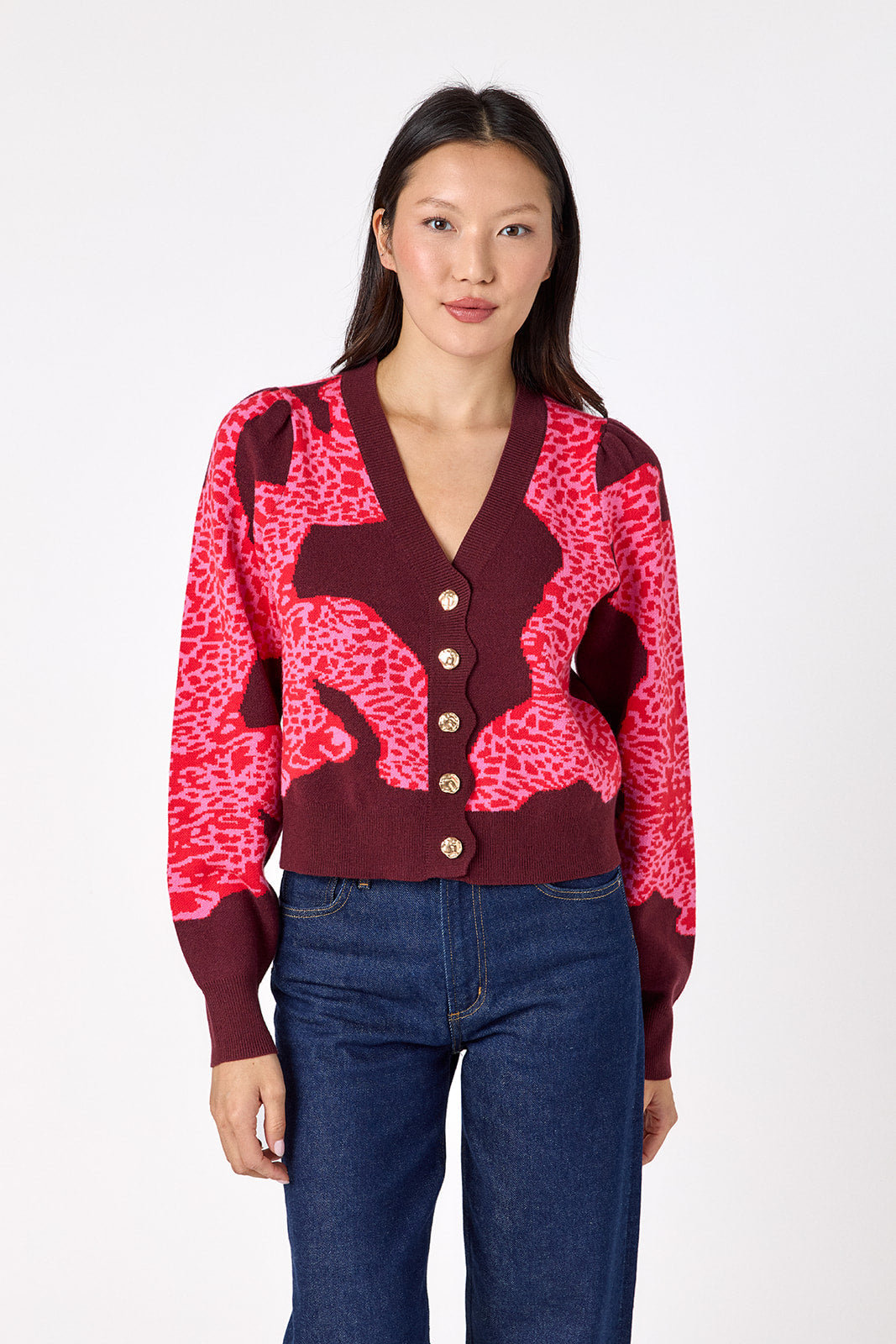 Catwalk Pink v-neck cardigan with scallop detail on model – CROSBY by Mollie Burch