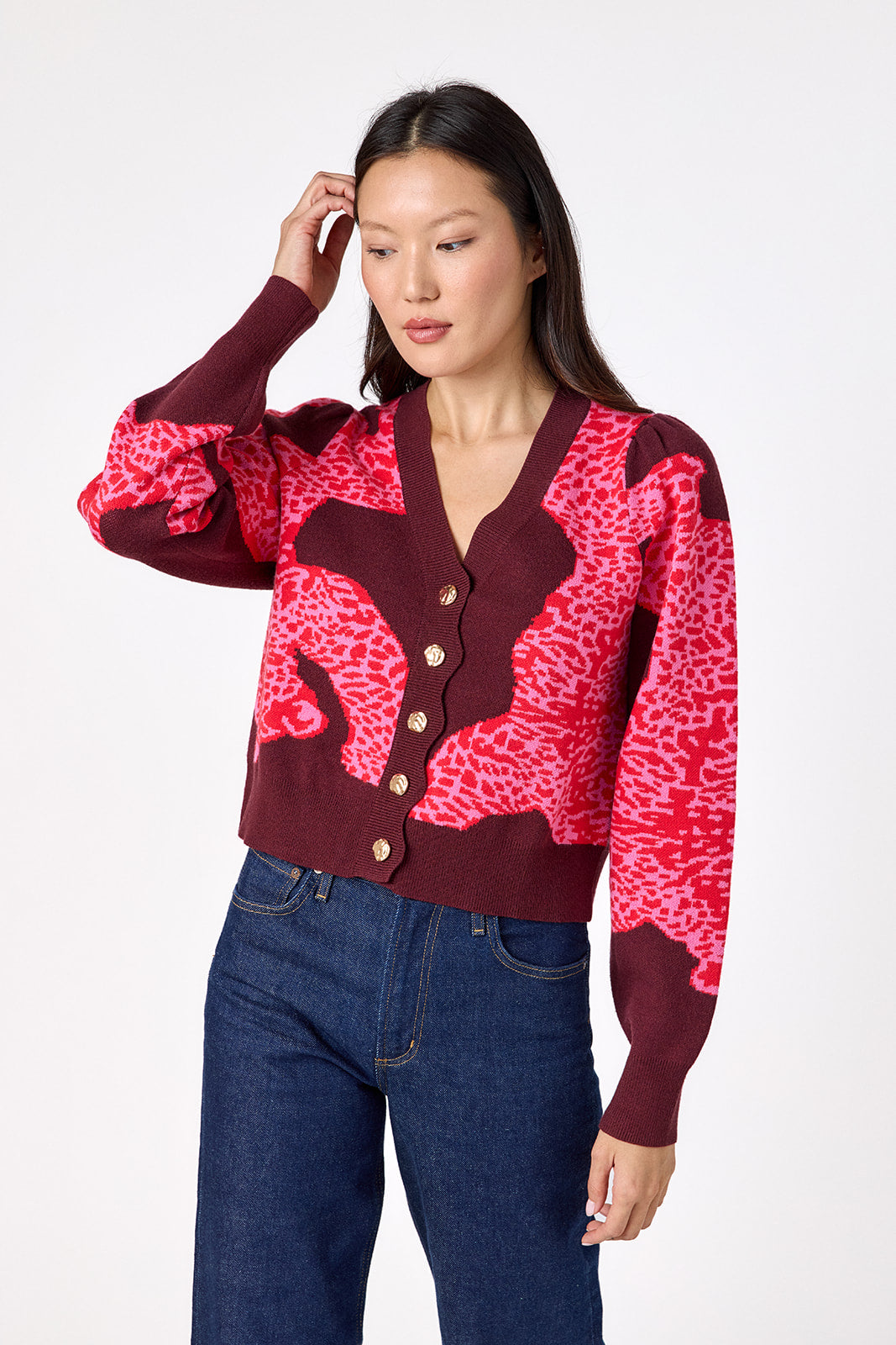 Catwalk Pink v-neck cardigan with scallop detail on model – CROSBY by Mollie Burch
