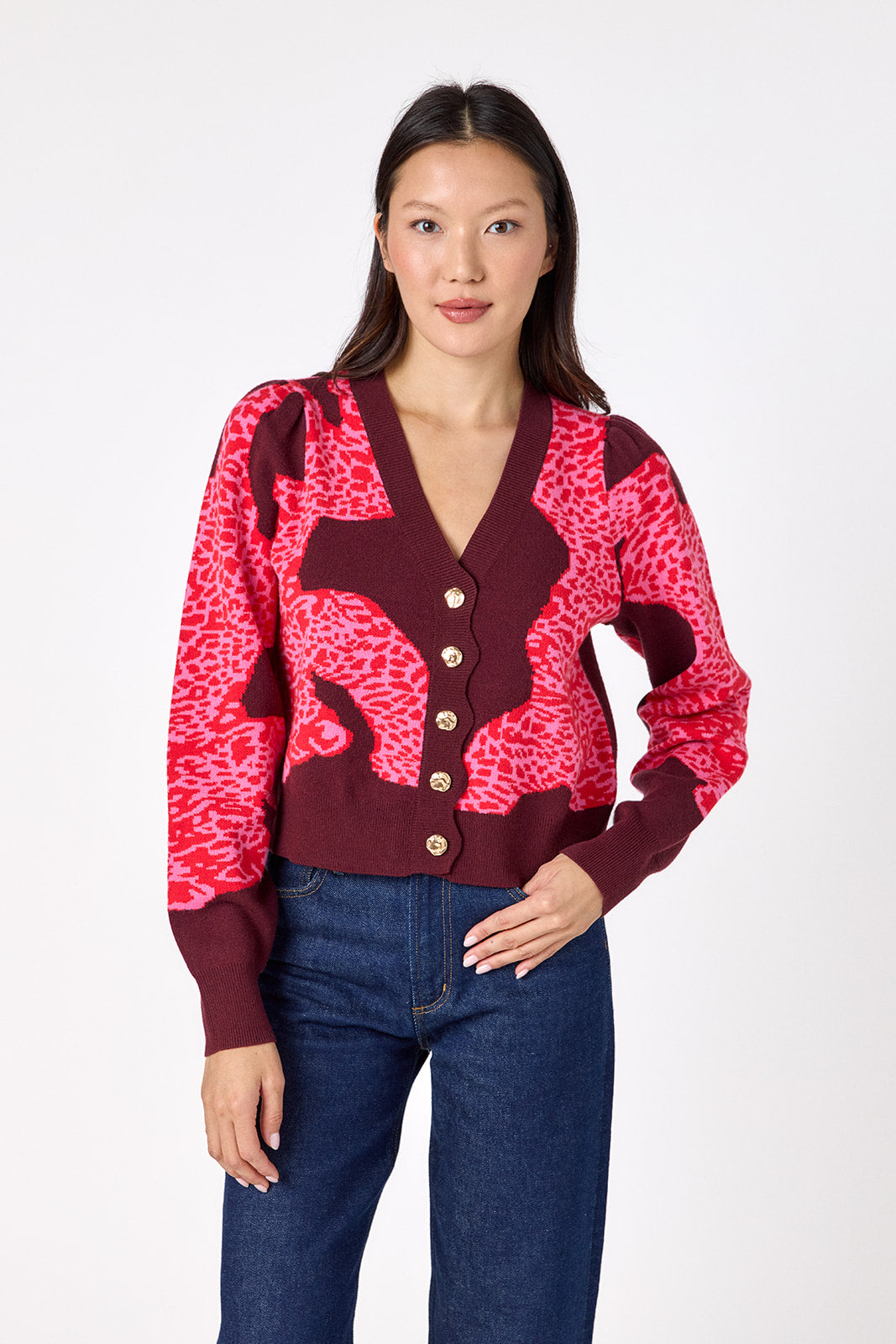 Catwalk Pink v-neck cardigan with scallop detail on model – CROSBY by Mollie Burch