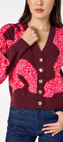 Catwalk Pink v-neck cardigan with scallop detail on model – CROSBY by Mollie Burch