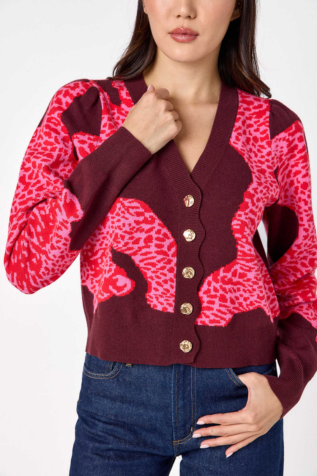 Catwalk Pink v-neck cardigan with scallop detail on model – CROSBY by Mollie Burch