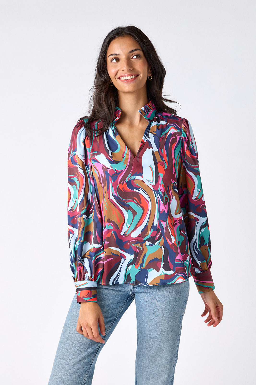 Color Current relaxed fit long-sleeve blouse with ruffle standing collar on model – CROSBY by Mollie Burch