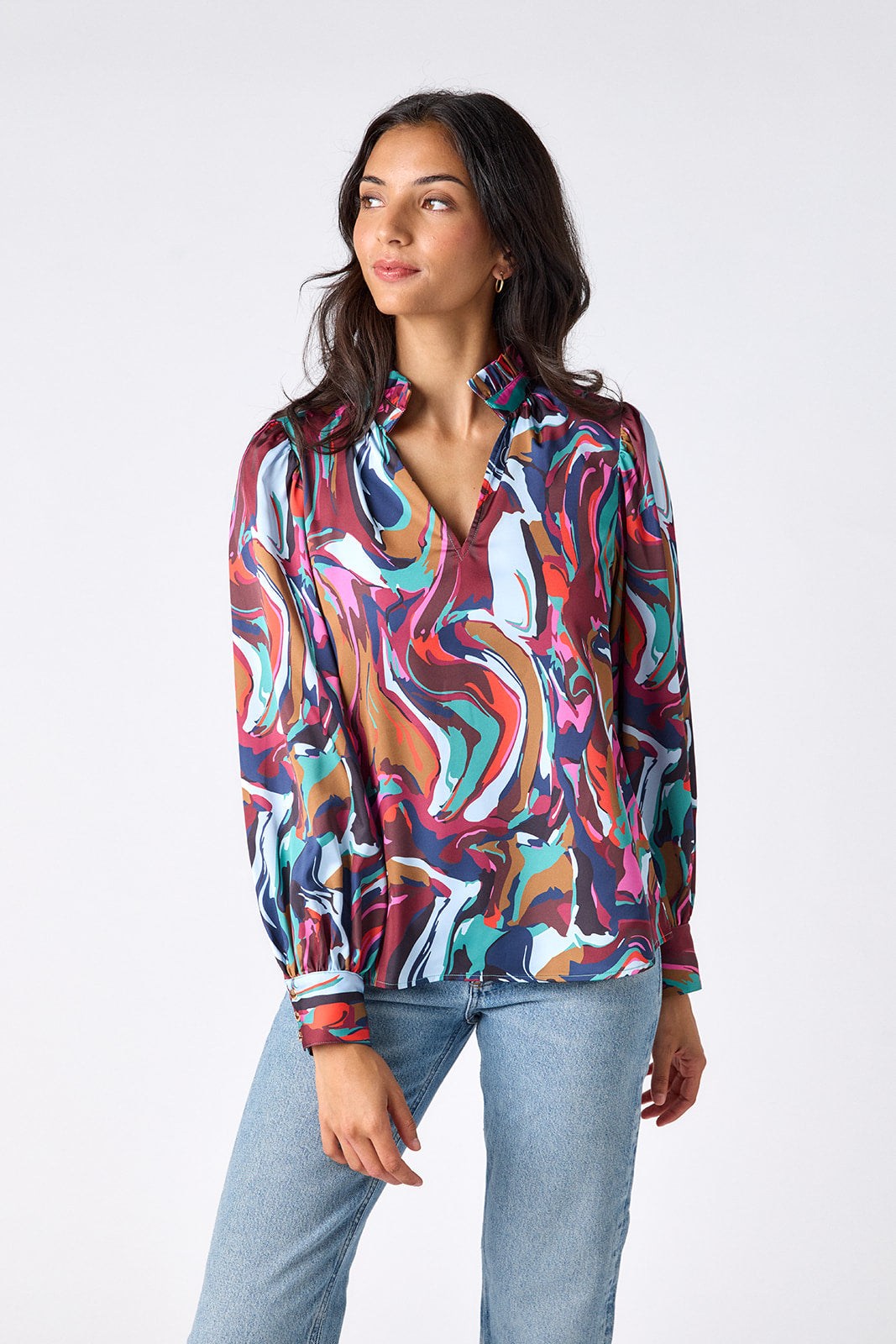 Color Current relaxed fit long-sleeve blouse with ruffle standing collar on model – CROSBY by Mollie Burch