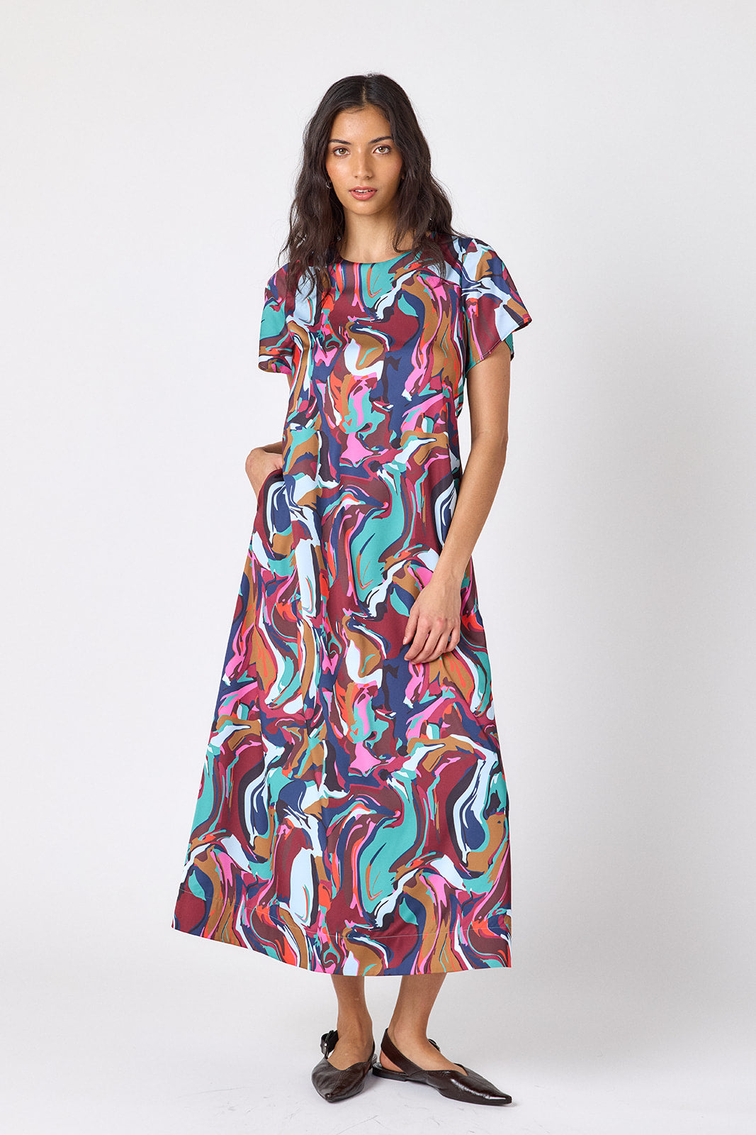 Color Current tent-style short sleeve dress on model – CROSBY by Mollie Burch