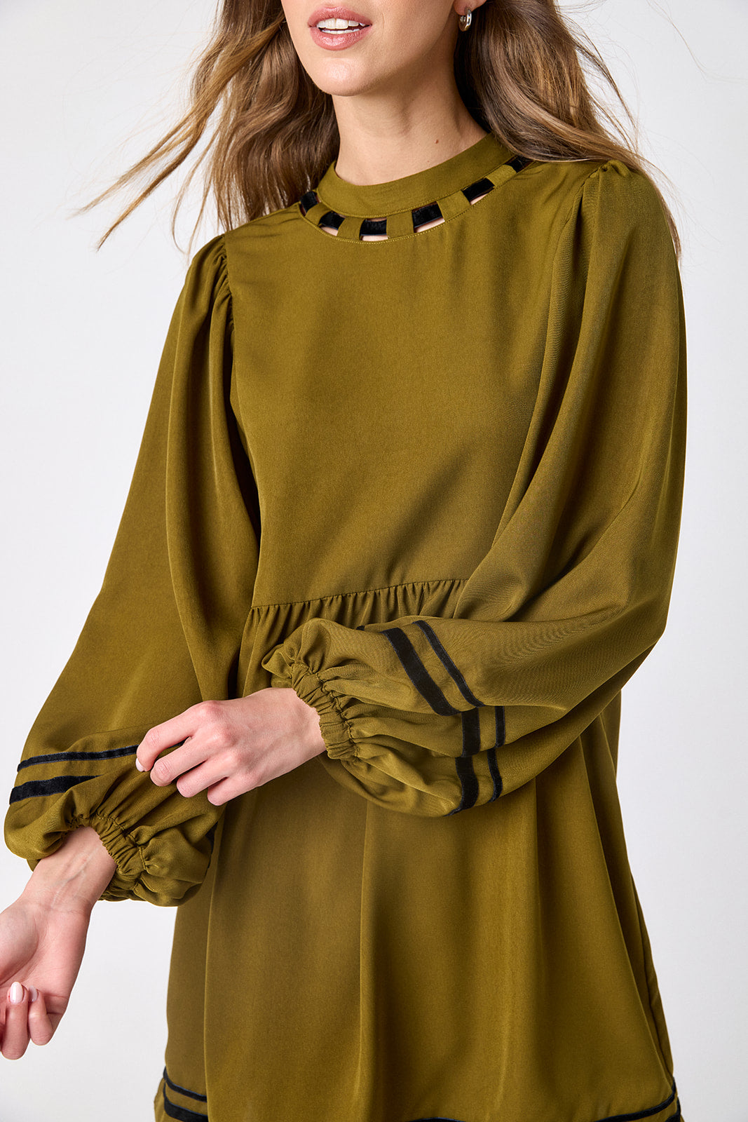 Dark Lichen above-the-knee dress with balloon sleeves on model – CROSBY by Mollie Burch