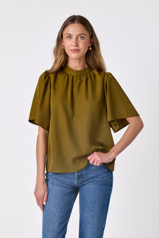 Dark Lichen A-line short sleeve top on model – CROSBY by Mollie Burch
