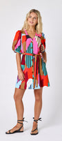Field Study v-neck dress with puff sleeves and a swingy silhouette on model — CROSBY by Mollie Burch