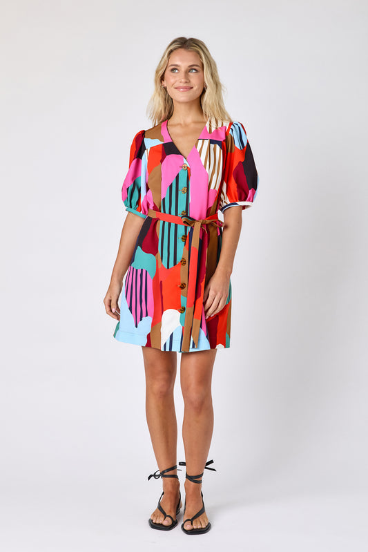 Field Study v-neck dress with puff sleeves and a swingy silhouette on model — CROSBY by Mollie Burch